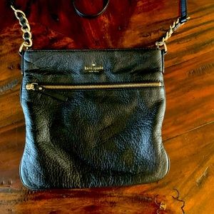 Kate Spade cross body. Black pebble leather,zipped pocket outside & inside.